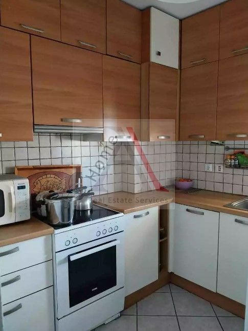 Apartment in Ilioupoli - view 1