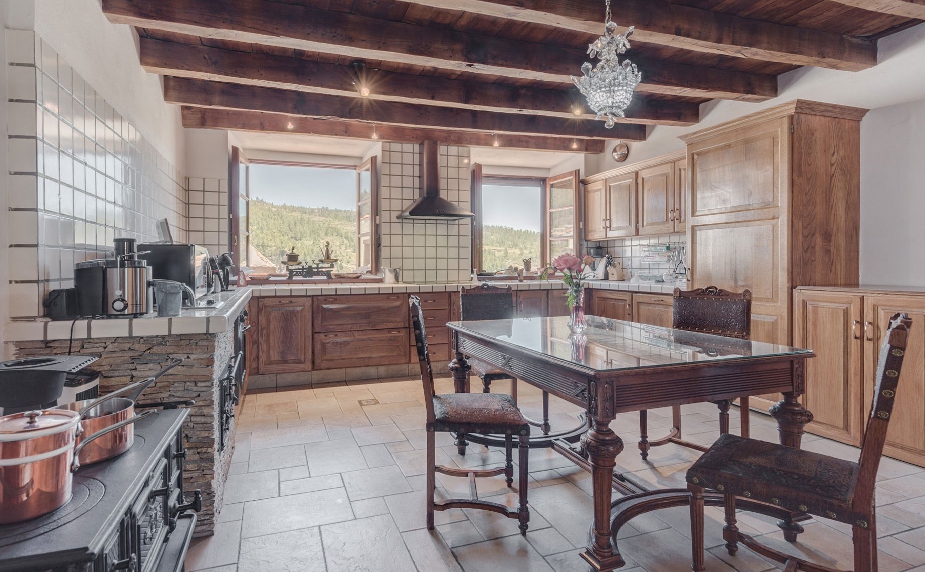 Canarian home with sight of mountains in the kitchen window.