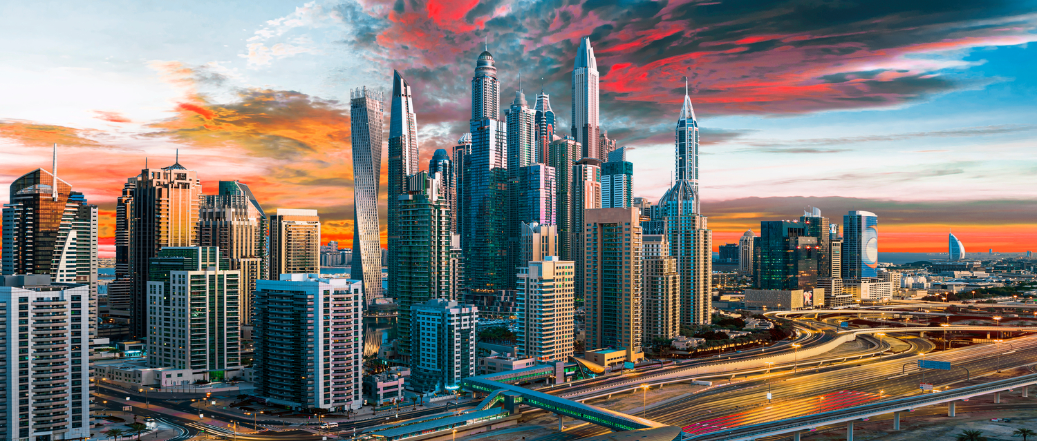 Dubai city center skyline with luxury skyscrapers at sunrise
