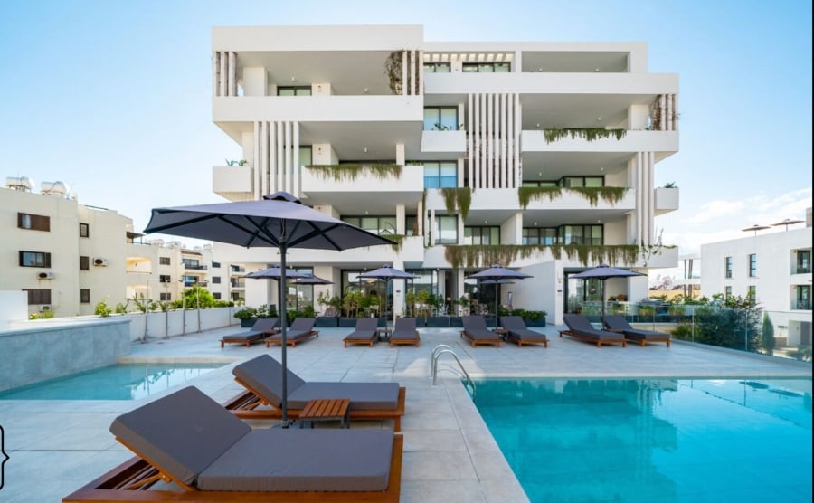 A luxury apartment in Paphos, Cyprus overlooking a communal pool