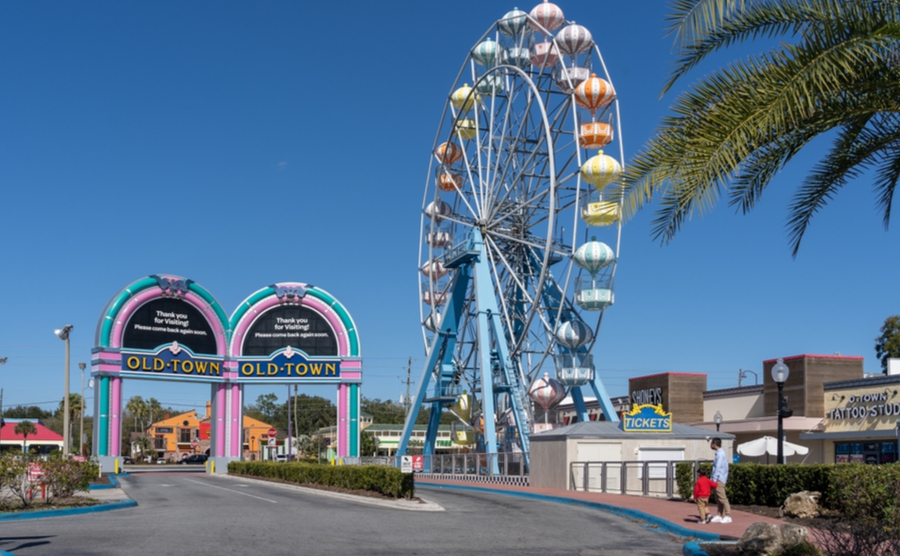 Kissimmee, Florida, USA - January 31, 2022: The Ferris Wheel at Old Town in Kissimmee, Florida, USA. Old Town is an Amusement park featuring old-time carnival rides, shopping and dining.