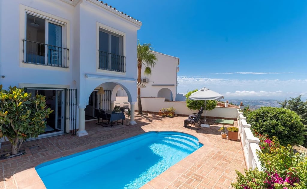 White villa with swimming pool