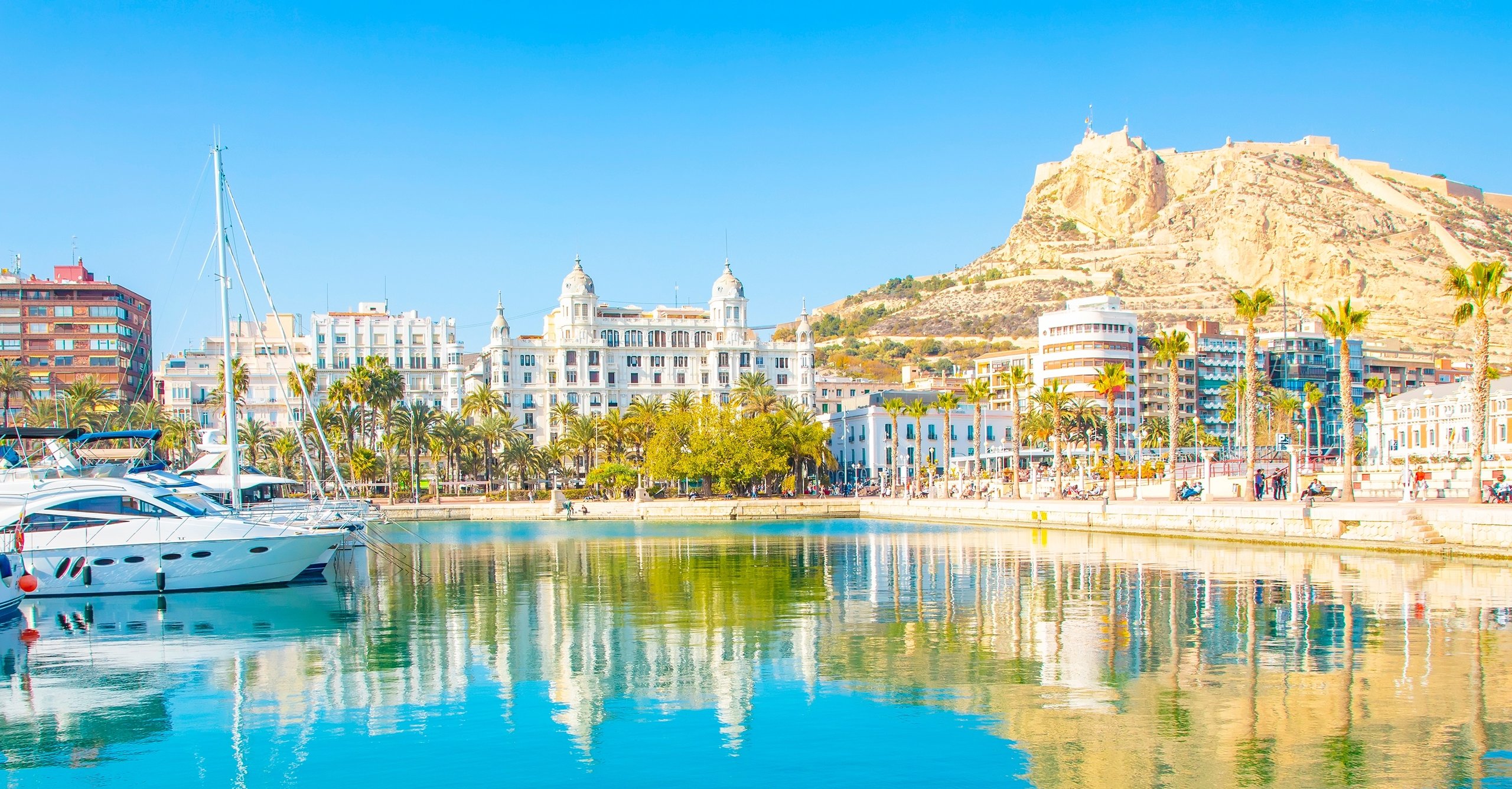 Panorama of Alicante old town, Costa Blanca sunny resort, Spain travel photo. Alicante city is the capital of the Alicante province.