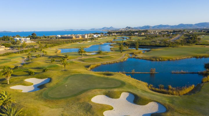 Golf-en-Murcia-720x400 Aerial. View from the sky at the golf courses in the tourist town Vale de Lobo.