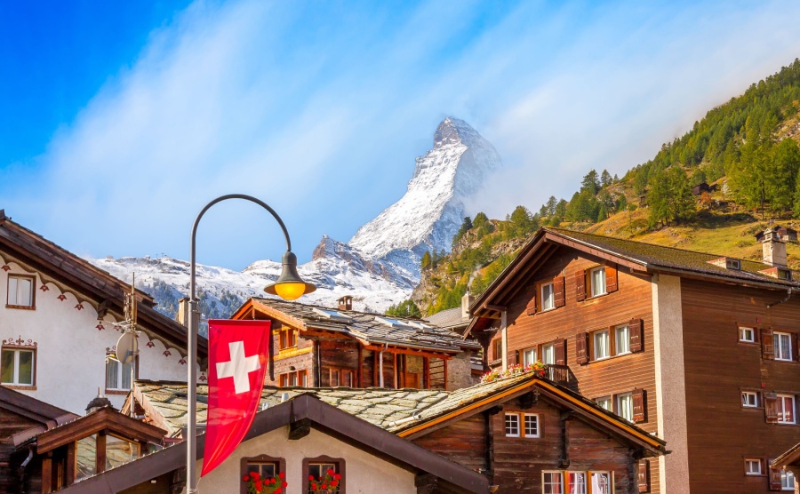 The peak of the Matterhorn emerges over the Zermatt skyline
