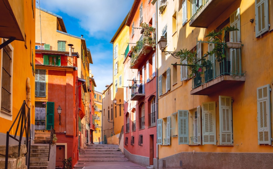 Sunny colorful historical houses in Old Town of Nice, French Riviera, Cote d'Azur, France