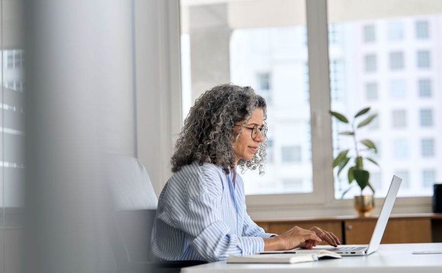 Mature woman looking at data