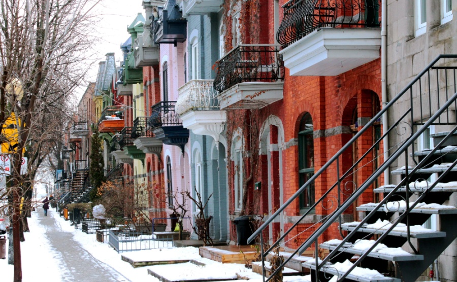 Beautiful houses of old historical Montreal neighborhood Plateau Mont Royal in winter season
