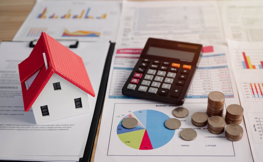 Someone calculating savings on their housing costs