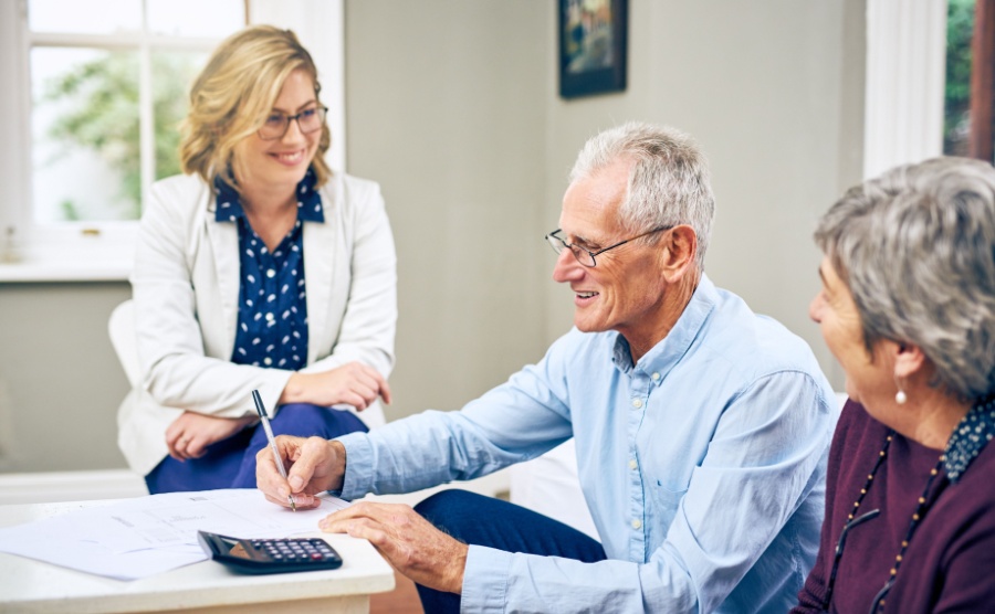 Old man signing life insurance