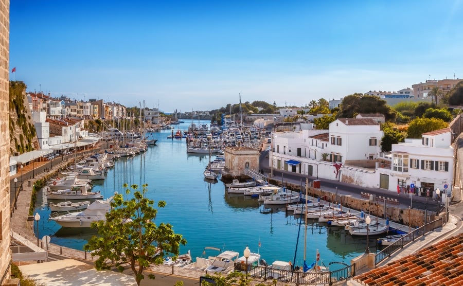 Boats and houses in Menorca