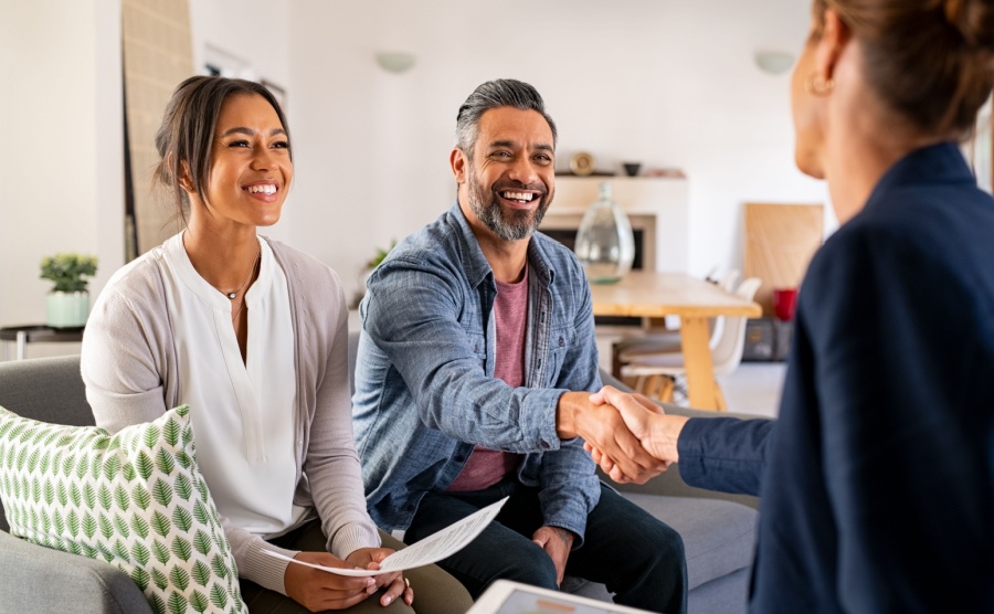 A couple having their mortgage approved