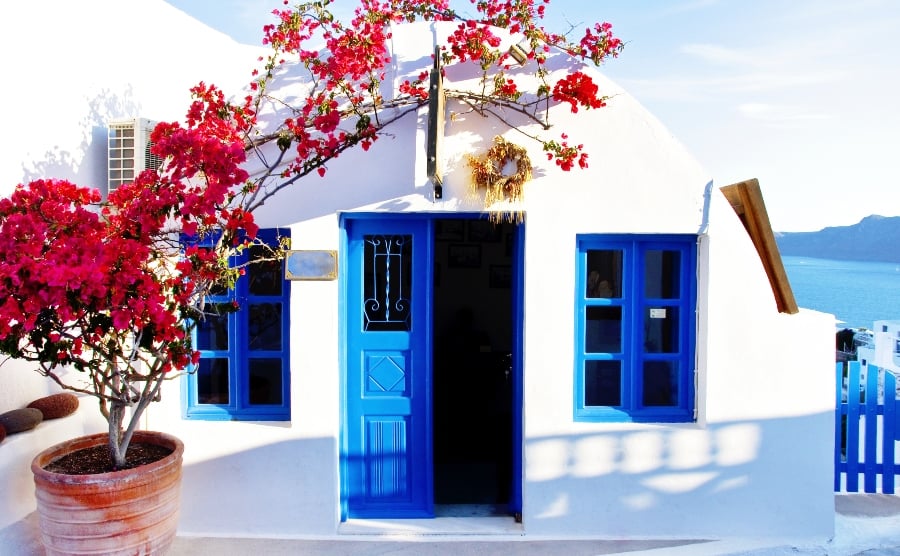 White house with blue windows and doors
