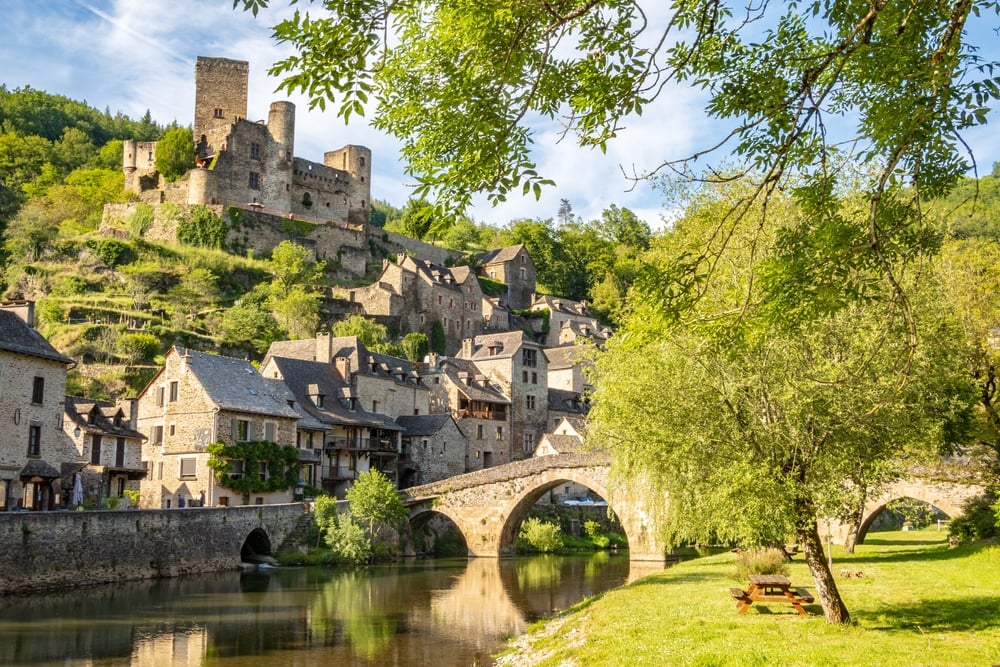 Belcastel village, castle and medieval bridge over Aveyron river, one of the most beautiful villages of France photographed in Occitanie region