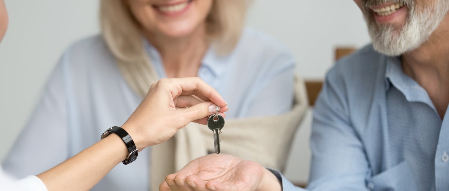 Couple taking key