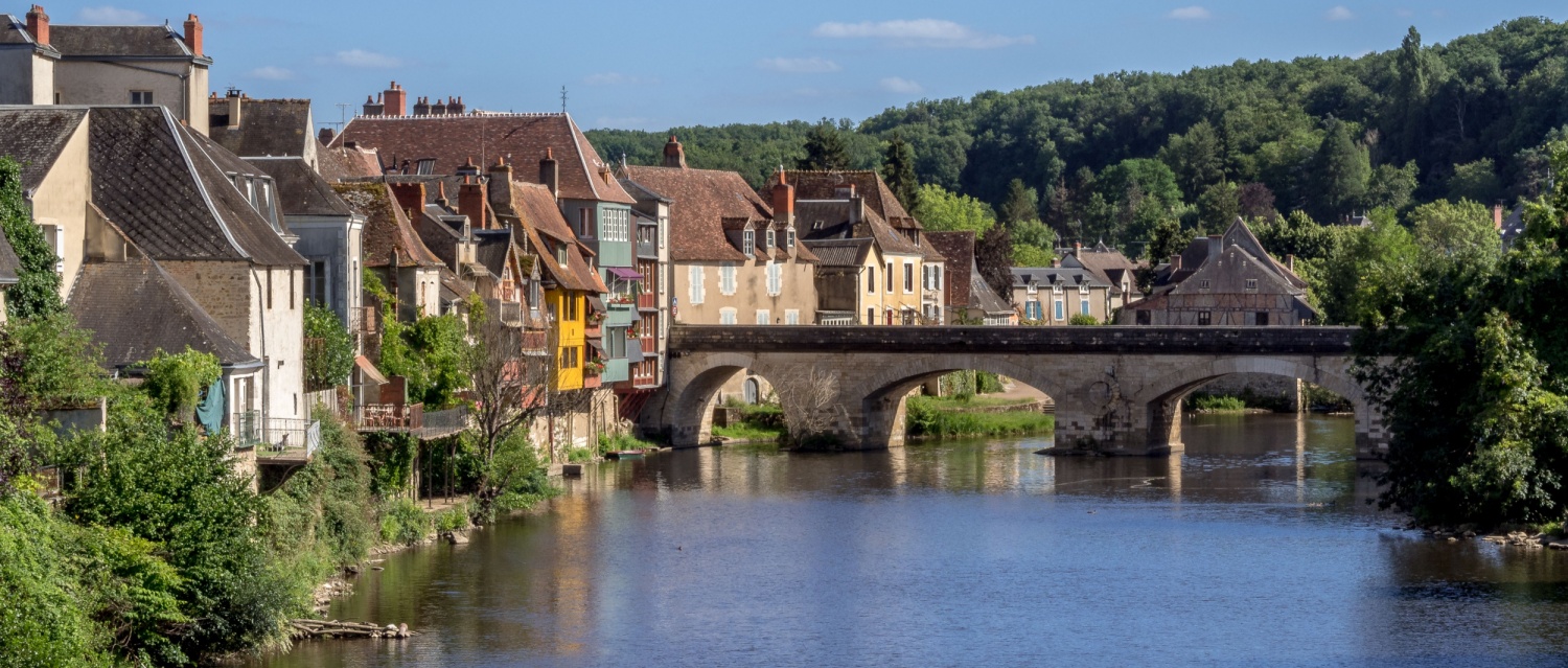 View of the old houses on the banks of the Creuse river in Argenton sur Creuse, France