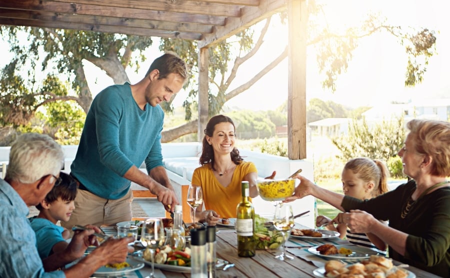Family enjoying lunch together outside
