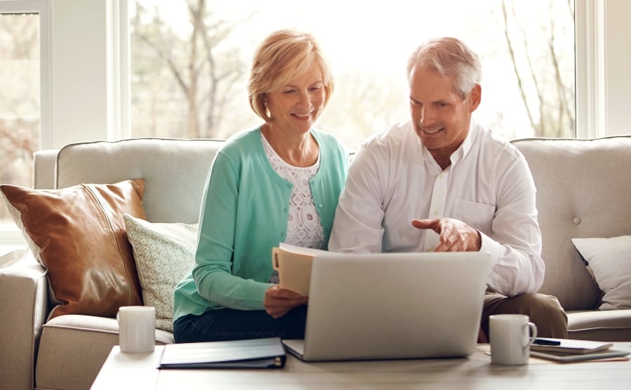 Senior couple working out budget