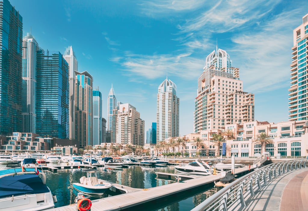 : View of residential towers and the yacht marina in Dubai Marina, a key district for international property buyers.