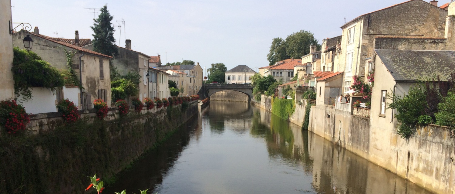 A few of water canals in the old town of Fontenay-le-Comte in Vendée, France.
