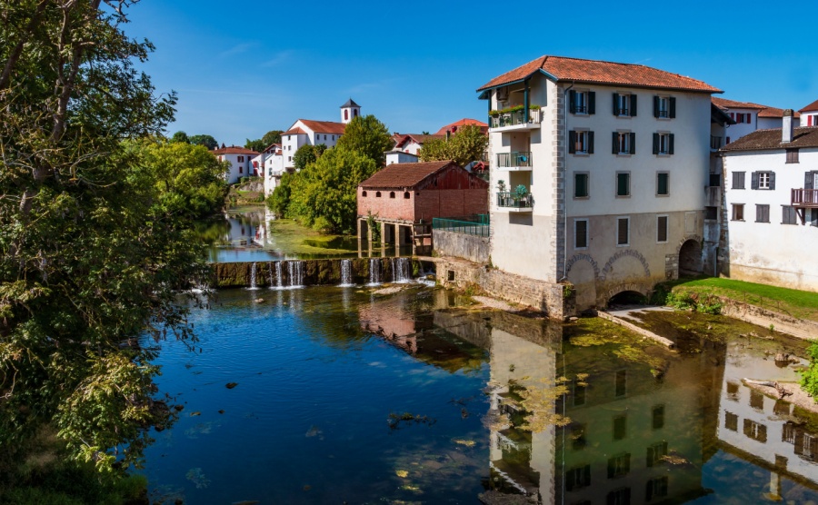 View of Saint-Palais in Pyrenees-Atlantiques departement and river Bidouze. French white town in Voie de Tours Chemin de Saint-Jaques