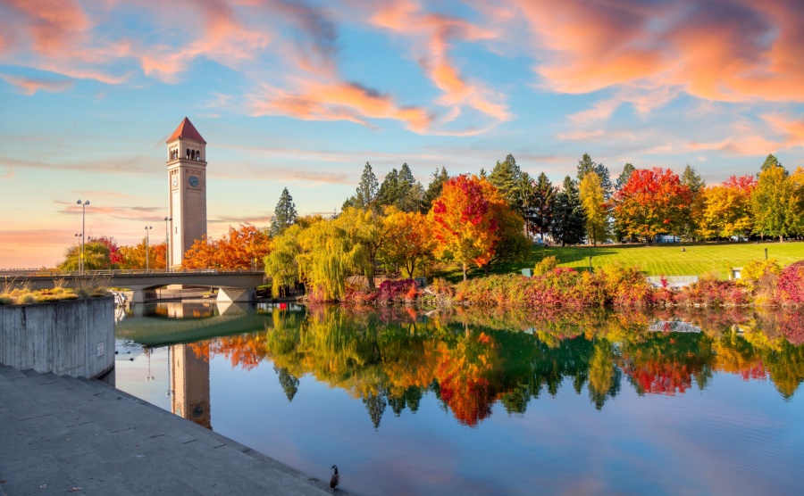 Colorful autumn sunset at Riverfront Park along the Spokane River in downtown Spokane, Washington, USA.