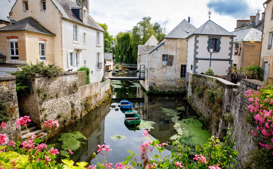 The water mill on the River Aure in the medieval town of Bayeux on the Normandy Coast of France.