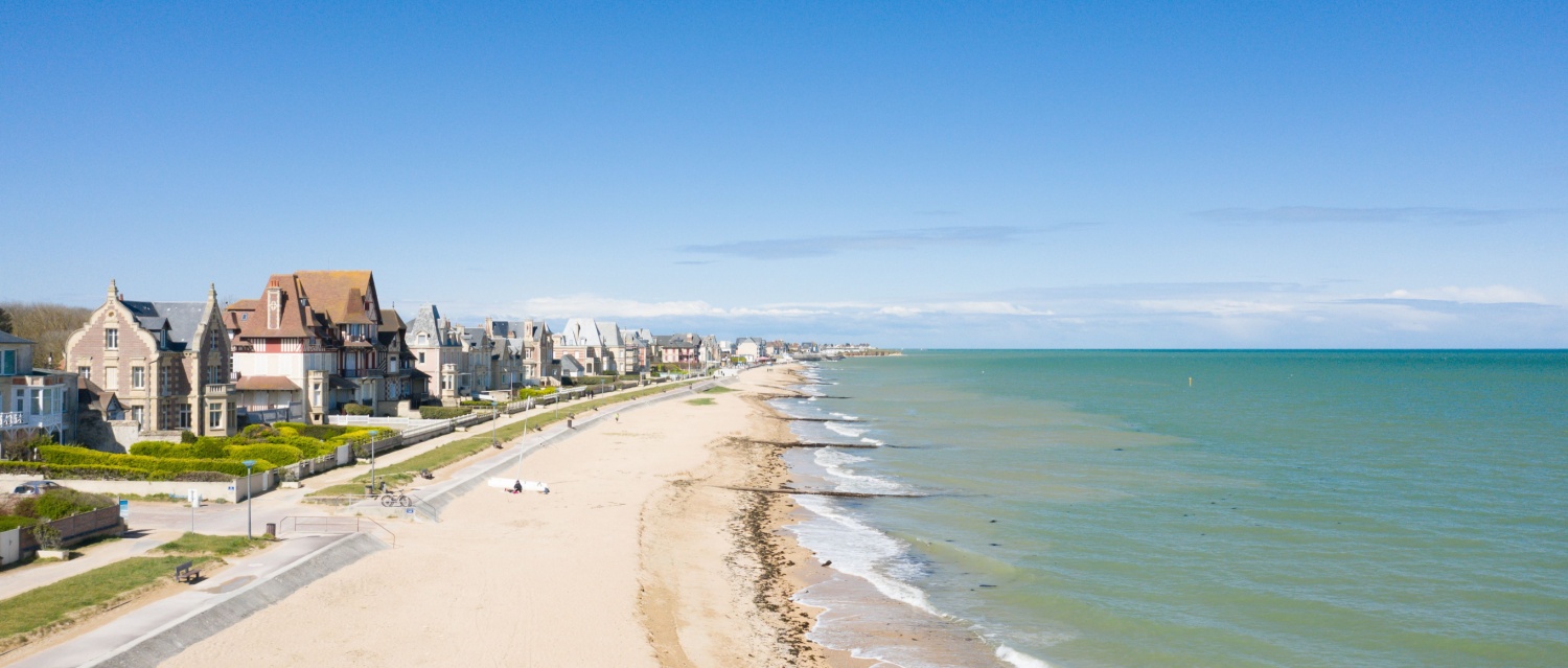 The long sandy beach of Lion-sur-Mer in Normandy, France