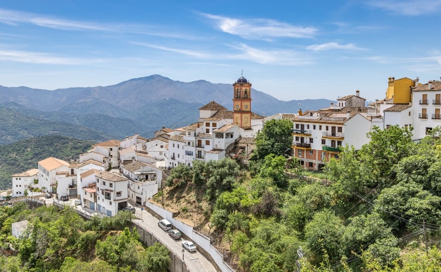White houses and road with mountains