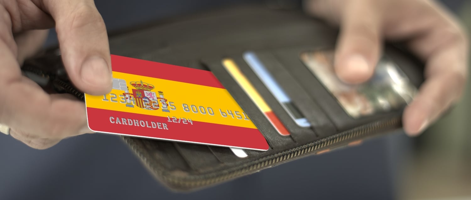 Spanish bank card being pulled from wallet