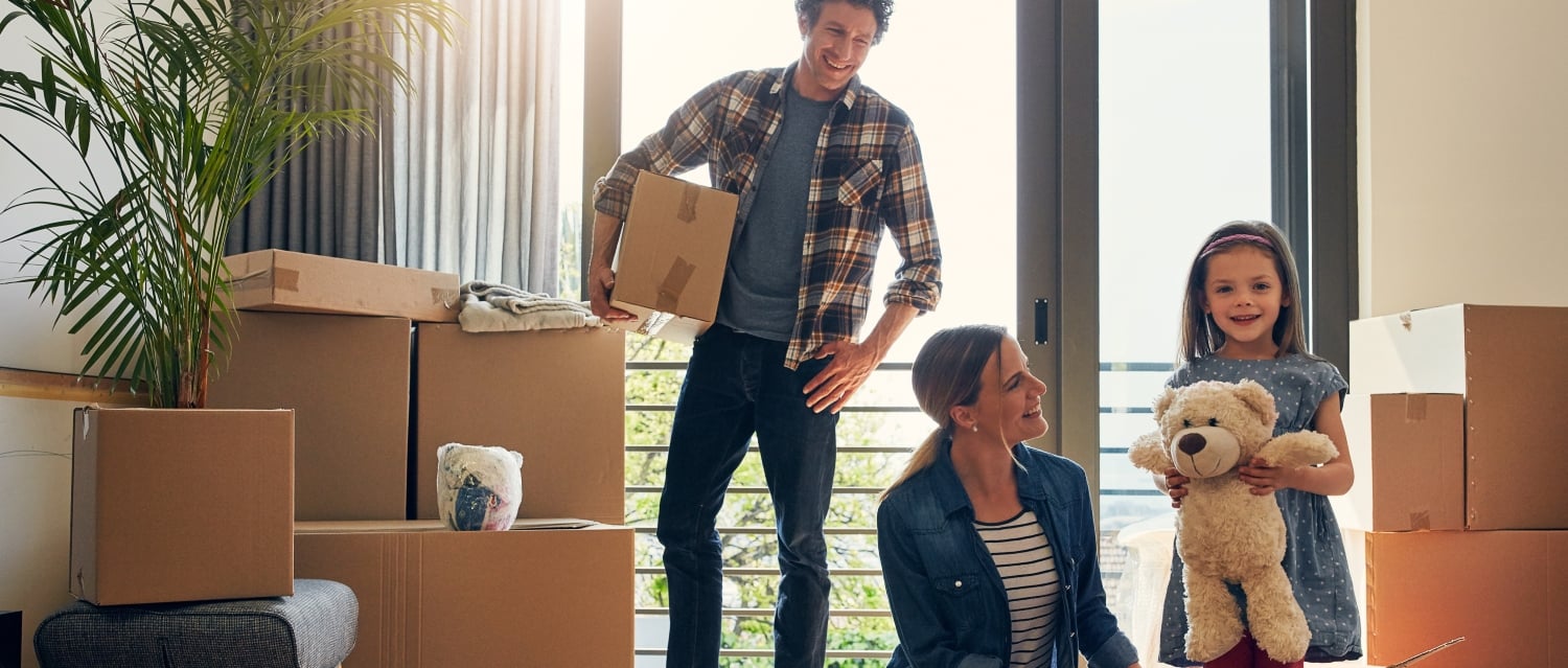 Family surrounded by boxes