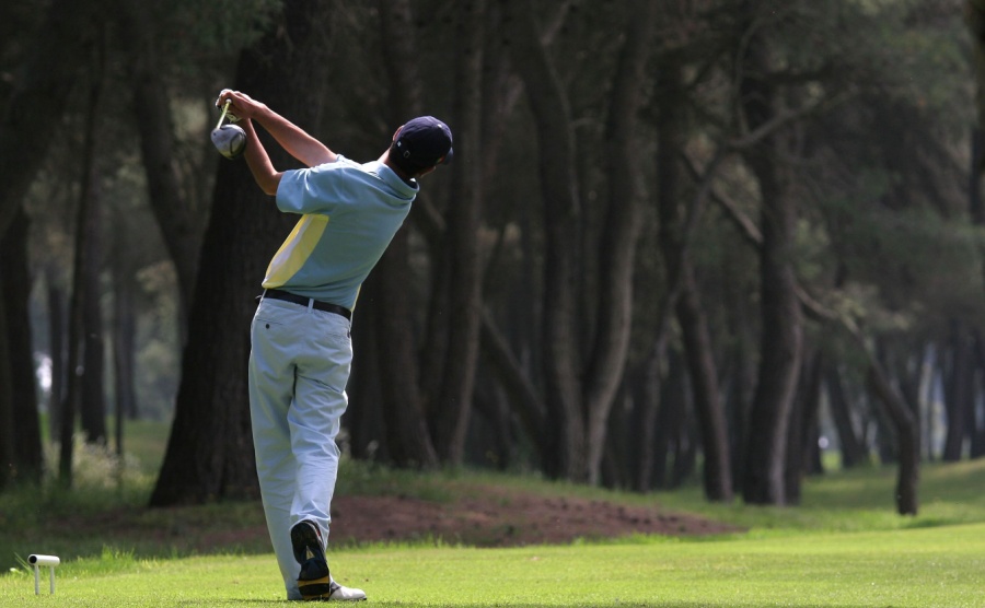 Golf swing in riva dei tessali golf course, italy