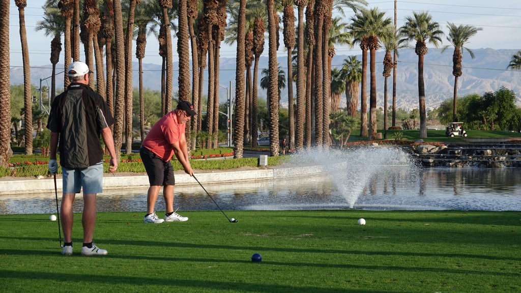 Two men playing golf in California