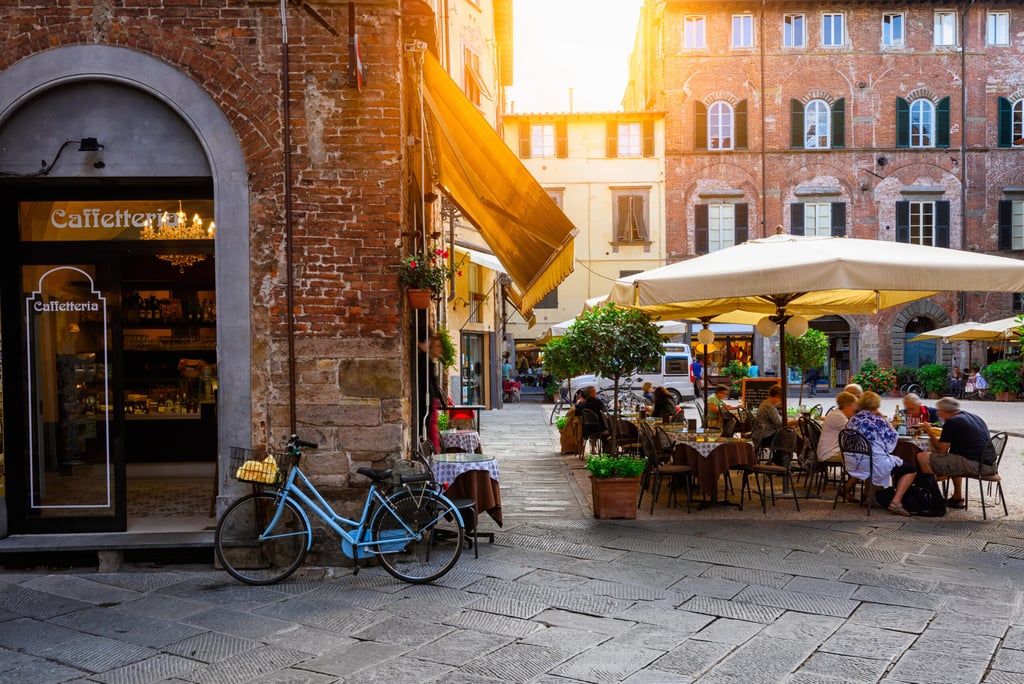 People dining at a cafe in Lucca