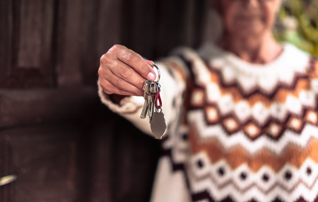 Woman holding house keys