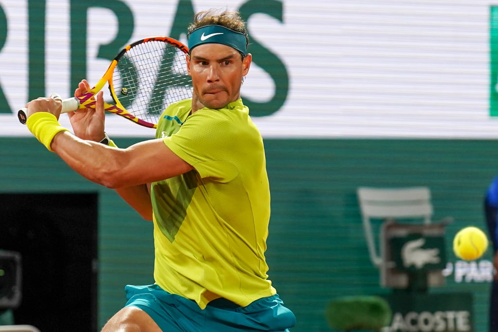 Rafael Nadal playing tennis in Paris