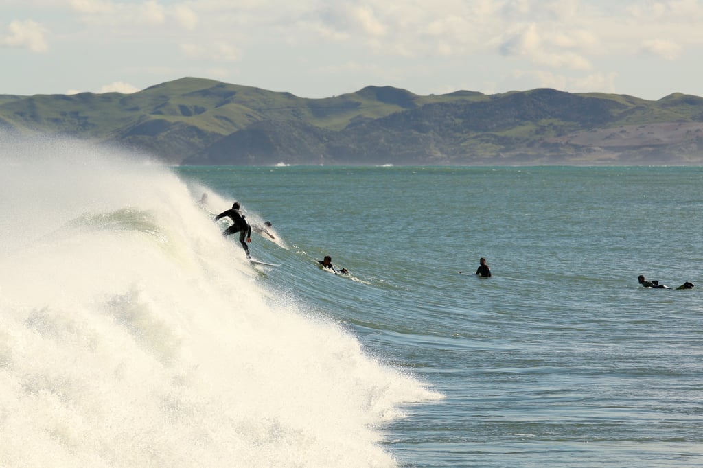 Surfers in Raglan
