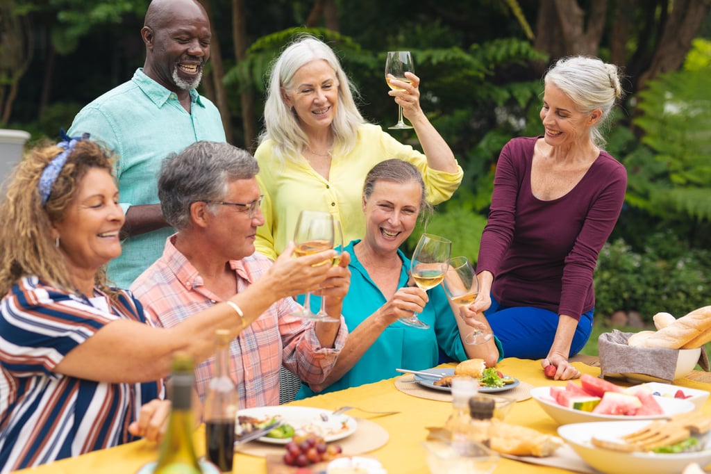 Friends eating and drinking outside