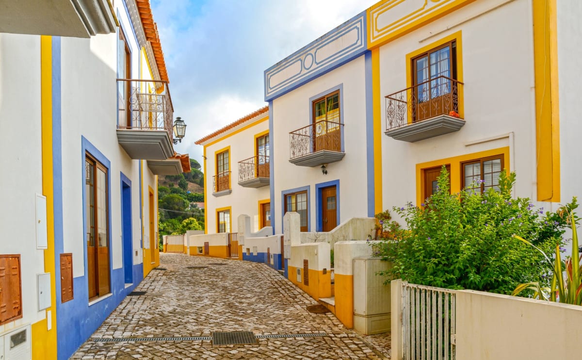 Village street with residential buildings in the town of Bordeira near Carrapateira, Municipality of Aljezur, District of Faro, Algarve Portugal