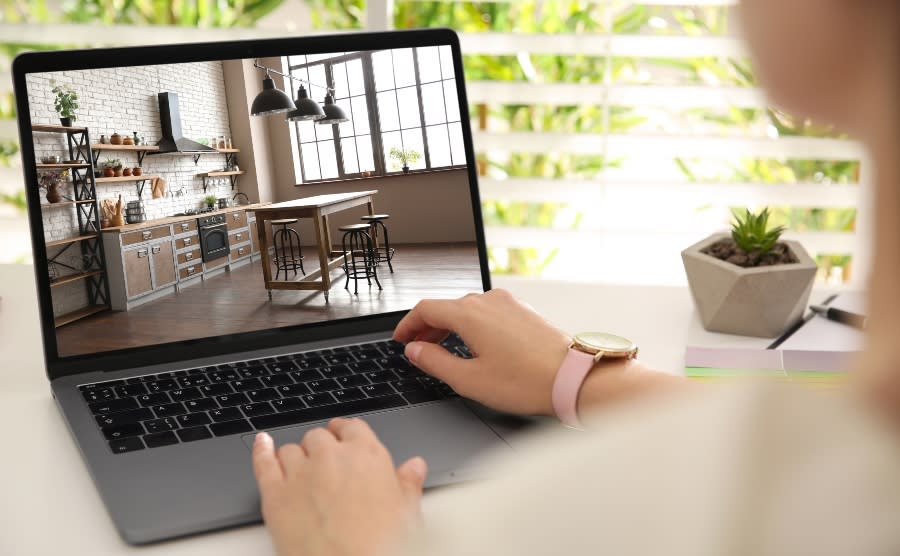 Woman looking at a home online