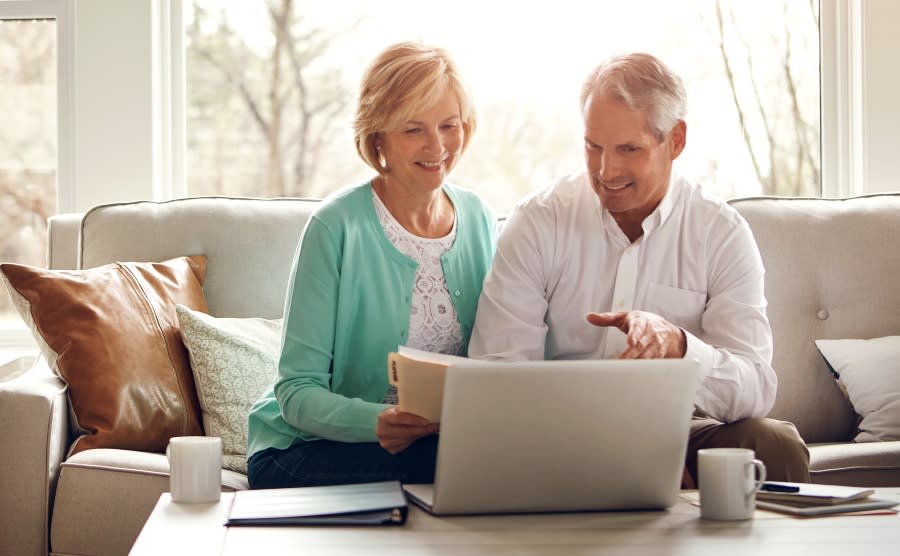 Senior couple working out budget