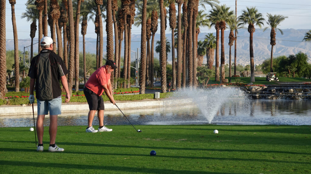 Two men playing golf in California