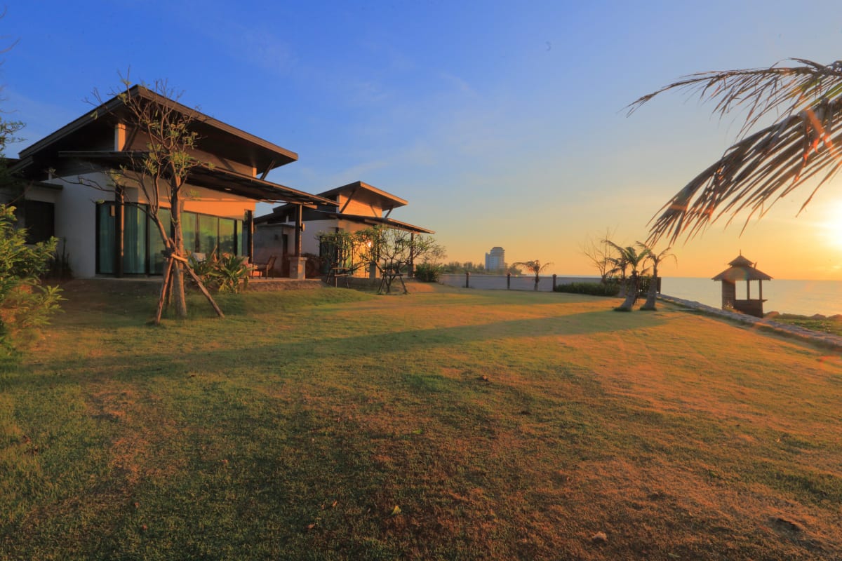 Coastal home overseas in the evening sun